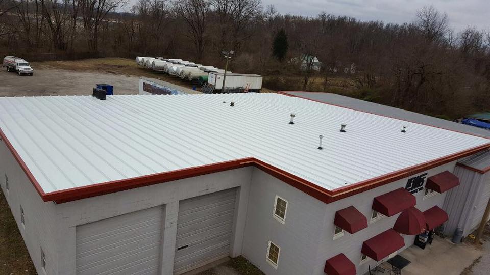Steel Roofing Commercial a metal roof with red and white stripes